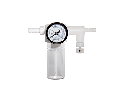 Vacuum regulator/moisture trap